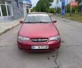 Красный Дэу Нексия, объемом двигателя 1.5 л и пробегом 244 тыс. км за 2000 $, фото 1 на Automoto.ua
