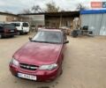 Красный Дэу Нексия, объемом двигателя 1.5 л и пробегом 211 тыс. км за 3250 $, фото 1 на Automoto.ua