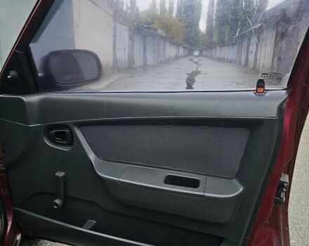 Червоний Деу Нексія, об'ємом двигуна 1.5 л та пробігом 200 тис. км за 900 $, фото 18 на Automoto.ua