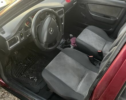 Червоний Деу Нексія, об'ємом двигуна 1.6 л та пробігом 345 тис. км за 1250 $, фото 7 на Automoto.ua