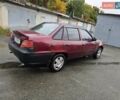 Червоний Деу Нексія, об'ємом двигуна 1.5 л та пробігом 200 тис. км за 900 $, фото 12 на Automoto.ua