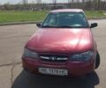 Червоний Деу Нексія, об'ємом двигуна 1.6 л та пробігом 165 тис. км за 1650 $, фото 6 на Automoto.ua
