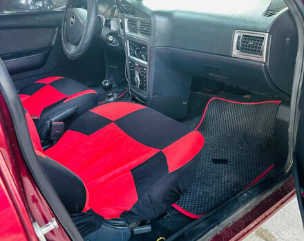 Червоний Деу Нексія, об'ємом двигуна 1.6 л та пробігом 168 тис. км за 3000 $, фото 12 на Automoto.ua