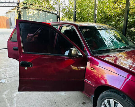 Червоний Деу Нексія, об'ємом двигуна 1.6 л та пробігом 168 тис. км за 3000 $, фото 10 на Automoto.ua