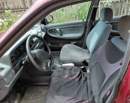 Червоний Деу Нексія, об'ємом двигуна 1.5 л та пробігом 176 тис. км за 1500 $, фото 5 на Automoto.ua