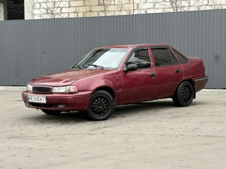 Красный Дэу Нексия, объемом двигателя 1.5 л и пробегом 99 тыс. км за 1299 $, фото 1 на Automoto.ua