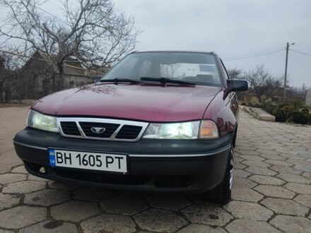 Деу Нексія 2007 у Одесі на Automoto.ua Червоний Деу Нексія, об'ємом двигуна 1.5 л та пробігом 211 тис. км за 2000 $, фото 1 на Automoto.ua