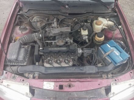 Красный Дэу Нексия, объемом двигателя 1.5 л и пробегом 233 тыс. км за 1750 $, фото 1 на Automoto.ua