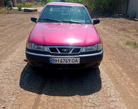 Червоний Деу Нексія, об'ємом двигуна 1.5 л та пробігом 306 тис. км за 1200 $, фото 1 на Automoto.ua