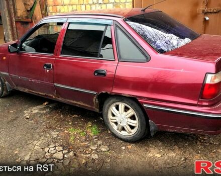 Красный Дэу Нексия, объемом двигателя 1.5 л и пробегом 245 тыс. км за 701 $, фото 1 на Automoto.ua