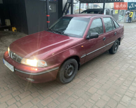 Красный Дэу Нексия, объемом двигателя 1.5 л и пробегом 240 тыс. км за 1100 $, фото 1 на Automoto.ua