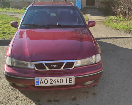 Красный Дэу Нексия, объемом двигателя 1.6 л и пробегом 423 тыс. км за 2000 $, фото 1 на Automoto.ua
