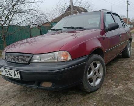 Червоний Деу Нексія, об'ємом двигуна 1.5 л та пробігом 111 тис. км за 1400 $, фото 1 на Automoto.ua