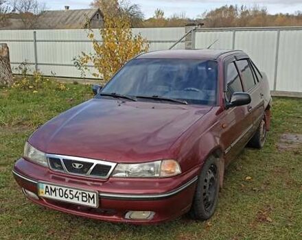 Червоний Деу Нексія, об'ємом двигуна 1.5 л та пробігом 221 тис. км за 1650 $, фото 1 на Automoto.ua