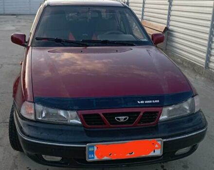 Красный Дэу Нексия, объемом двигателя 1.5 л и пробегом 222 тыс. км за 2000 $, фото 1 на Automoto.ua