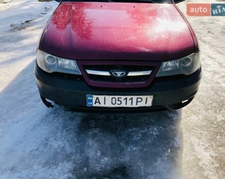 Червоний Деу Нексія, об'ємом двигуна 1.6 л та пробігом 157 тис. км за 1126 $, фото 1 на Automoto.ua