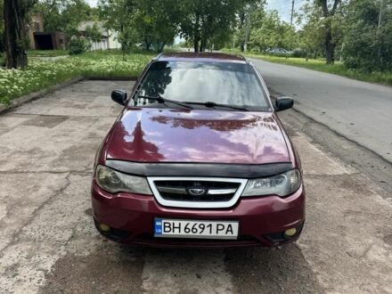 Червоний Деу Нексія, об'ємом двигуна 1.5 л та пробігом 181 тис. км за 1399 $, фото 1 на Automoto.ua