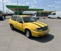 Желтый Дэу Нексия, объемом двигателя 1.5 л и пробегом 150 тыс. км за 950 $, фото 1 на Automoto.ua