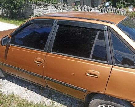 Жовтий Деу Нексія, об'ємом двигуна 2 л та пробігом 319 тис. км за 1976 $, фото 4 на Automoto.ua