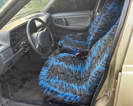 Желтый Дэу Нексия, объемом двигателя 1.5 л и пробегом 290 тыс. км за 775 $, фото 6 на Automoto.ua