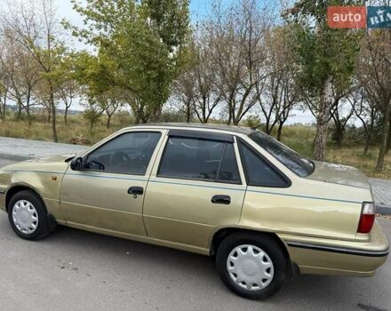Жовтий Деу Нексія, об'ємом двигуна 1.6 л та пробігом 286 тис. км за 1850 $, фото 12 на Automoto.ua