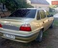 Желтый Дэу Нексия, объемом двигателя 1.5 л и пробегом 230 тыс. км за 2100 $, фото 2 на Automoto.ua
