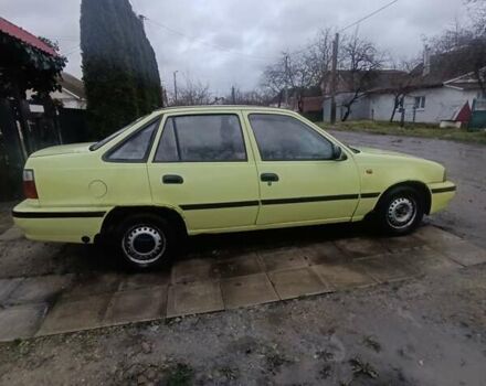 Жовтий Деу Нексія, об'ємом двигуна 1.5 л та пробігом 215 тис. км за 799 $, фото 7 на Automoto.ua