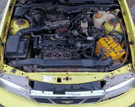 Жовтий Деу Нексія, об'ємом двигуна 1.5 л та пробігом 215 тис. км за 799 $, фото 11 на Automoto.ua