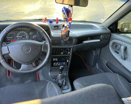 Желтый Дэу Нексия, объемом двигателя 1.5 л и пробегом 112 тыс. км за 2300 $, фото 24 на Automoto.ua