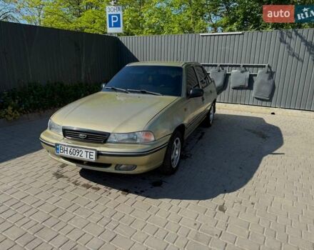 Желтый Дэу Нексия, объемом двигателя 1.5 л и пробегом 170 тыс. км за 1400 $, фото 4 на Automoto.ua