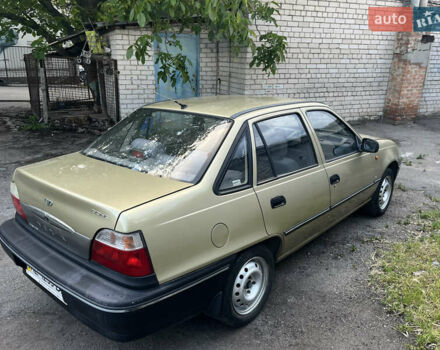 Жовтий Деу Нексія, об'ємом двигуна 1.5 л та пробігом 140 тис. км за 2000 $, фото 5 на Automoto.ua