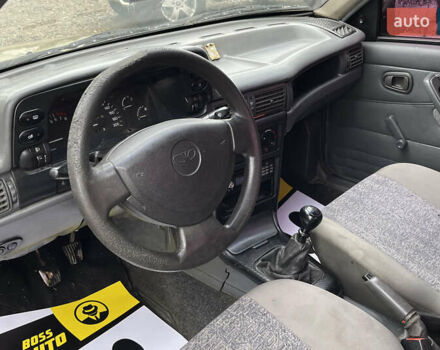 Жовтий Деу Нексія, об'ємом двигуна 1.5 л та пробігом 450 тис. км за 1500 $, фото 9 на Automoto.ua