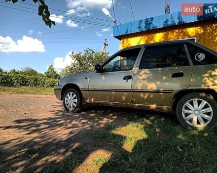 Жовтий Деу Нексія, об'ємом двигуна 1.5 л та пробігом 185 тис. км за 2000 $, фото 1 на Automoto.ua