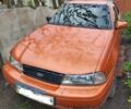 Жовтий Деу Нексія, об'ємом двигуна 1.6 л та пробігом 210 тис. км за 1449 $, фото 1 на Automoto.ua