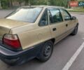 Желтый Дэу Нексия, объемом двигателя 1.5 л и пробегом 210 тыс. км за 1950 $, фото 9 на Automoto.ua