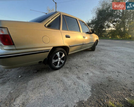 Желтый Дэу Нексия, объемом двигателя 1.5 л и пробегом 112 тыс. км за 2300 $, фото 11 на Automoto.ua