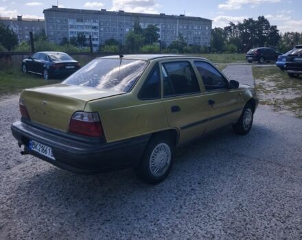 Желтый Дэу Нексия, объемом двигателя 1.5 л и пробегом 328 тыс. км за 1099 $, фото 2 на Automoto.ua