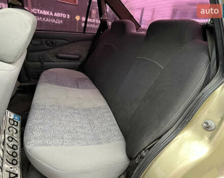 Жовтий Деу Нексія, об'ємом двигуна 1.5 л та пробігом 450 тис. км за 1500 $, фото 13 на Automoto.ua