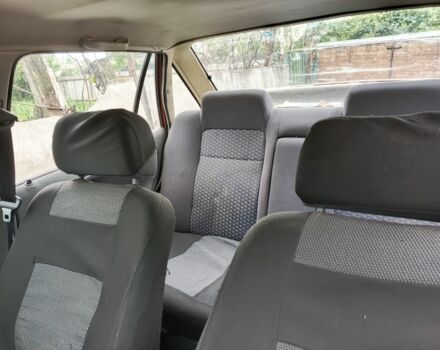 Жовтий Деу Нексія, об'ємом двигуна 1.6 л та пробігом 210 тис. км за 1402 $, фото 3 на Automoto.ua