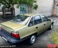 Жовтий Деу Нексія, об'ємом двигуна 1.5 л та пробігом 140 тис. км за 2000 $, фото 1 на Automoto.ua