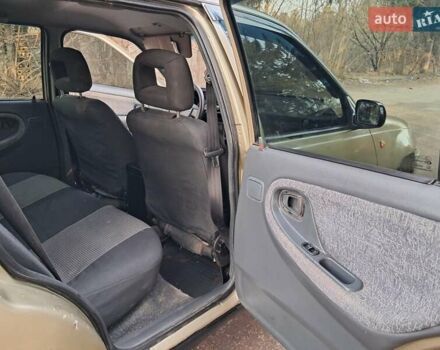 Жовтий Деу Нексія, об'ємом двигуна 1.5 л та пробігом 205 тис. км за 1399 $, фото 24 на Automoto.ua