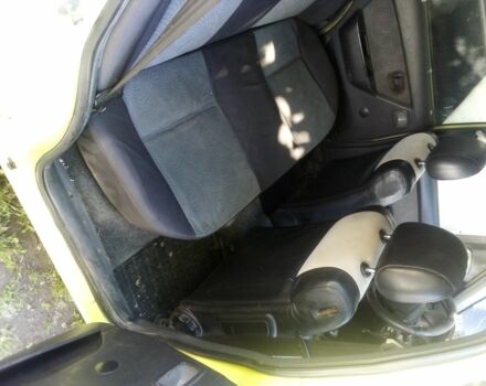 Желтый Дэу Нексия, объемом двигателя 1 л и пробегом 252 тыс. км за 1700 $, фото 2 на Automoto.ua