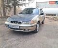Жовтий Деу Нексія, об'ємом двигуна 1.5 л та пробігом 205 тис. км за 1399 $, фото 3 на Automoto.ua