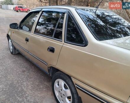 Жовтий Деу Нексія, об'ємом двигуна 1.5 л та пробігом 205 тис. км за 1399 $, фото 8 на Automoto.ua