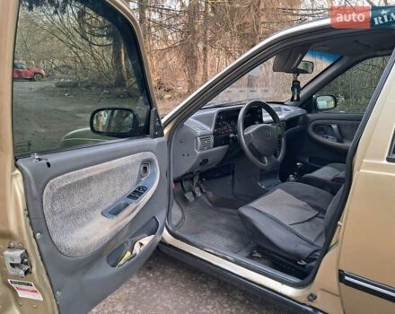 Жовтий Деу Нексія, об'ємом двигуна 1.5 л та пробігом 205 тис. км за 1399 $, фото 19 на Automoto.ua