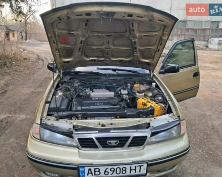Жовтий Деу Нексія, об'ємом двигуна 1.5 л та пробігом 205 тис. км за 1399 $, фото 33 на Automoto.ua