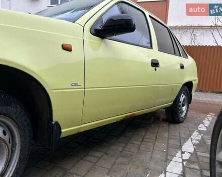 Жовтий Деу Нексія, об'ємом двигуна 1.5 л та пробігом 186 тис. км за 2000 $, фото 18 на Automoto.ua