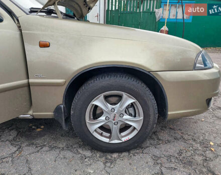 Жовтий Деу Нексія, об'ємом двигуна 1.6 л та пробігом 60 тис. км за 3350 $, фото 10 на Automoto.ua