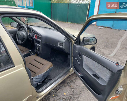 Жовтий Деу Нексія, об'ємом двигуна 1.6 л та пробігом 60 тис. км за 3350 $, фото 14 на Automoto.ua