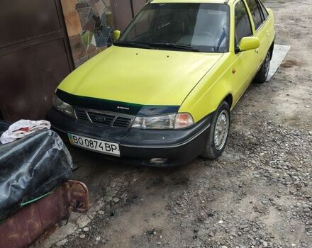 Желтый Дэу Нексия, объемом двигателя 1.5 л и пробегом 180 тыс. км за 1200 $, фото 1 на Automoto.ua